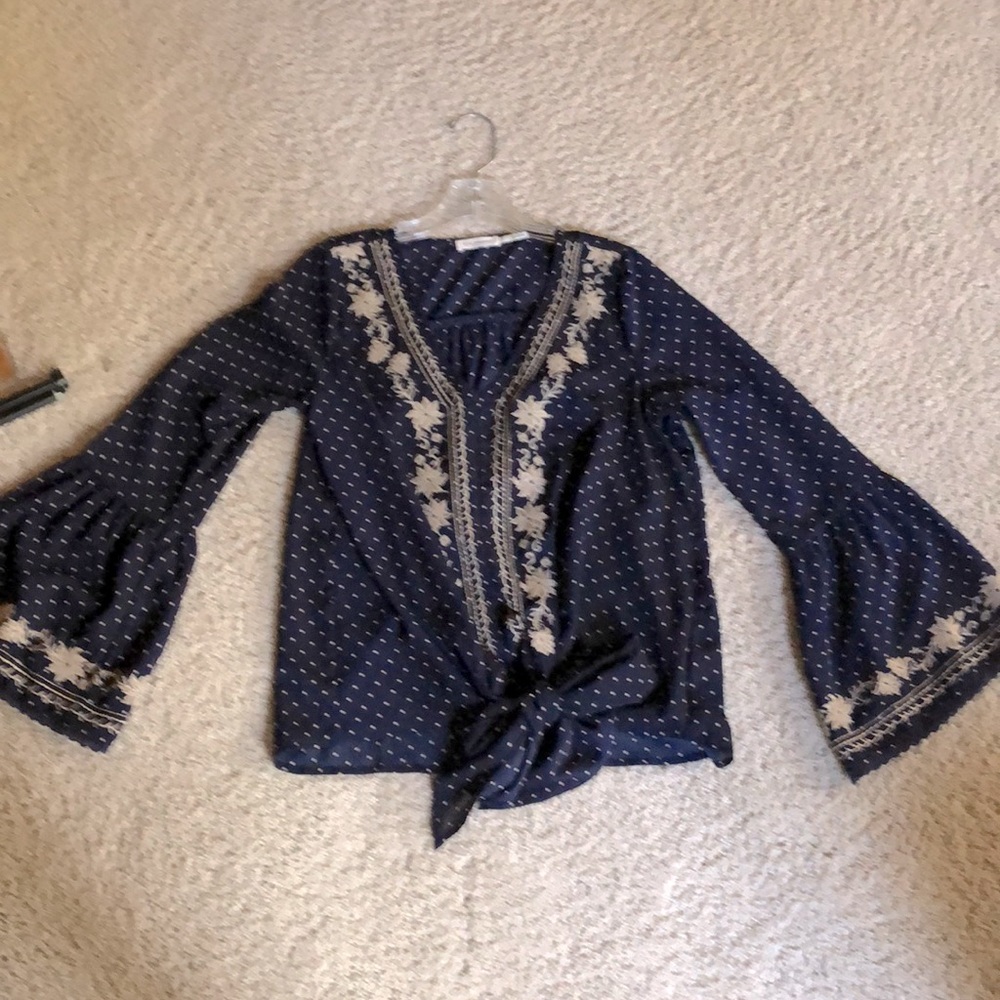 Small blue and ivory blouse